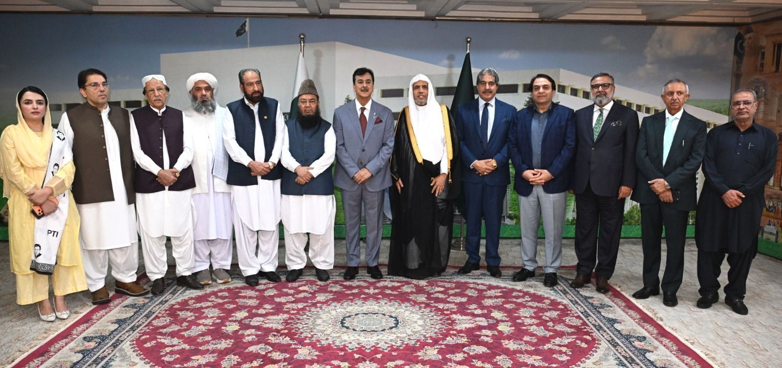 Chairman Senate Syed Yousaf Raza Gilani and Senators in a group photo with H.E. Dr. Mohammad bin Abdulkarim Al-Issa, Secretary-General of the Muslim World League (MWL) at Parliament House Islamabad