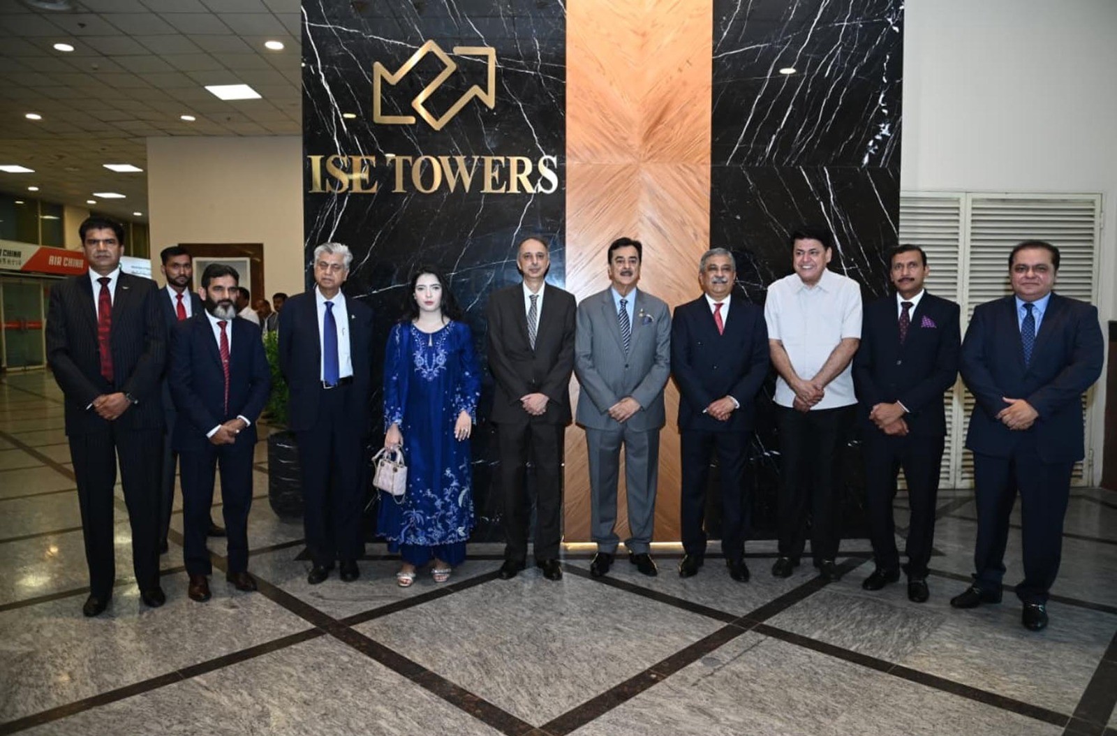 Acting President Syed Yousaf Raza Gilani in a group photograph with members of the Board of Directors of Islamabad Stock Exchange (ISE) Towers Limited.